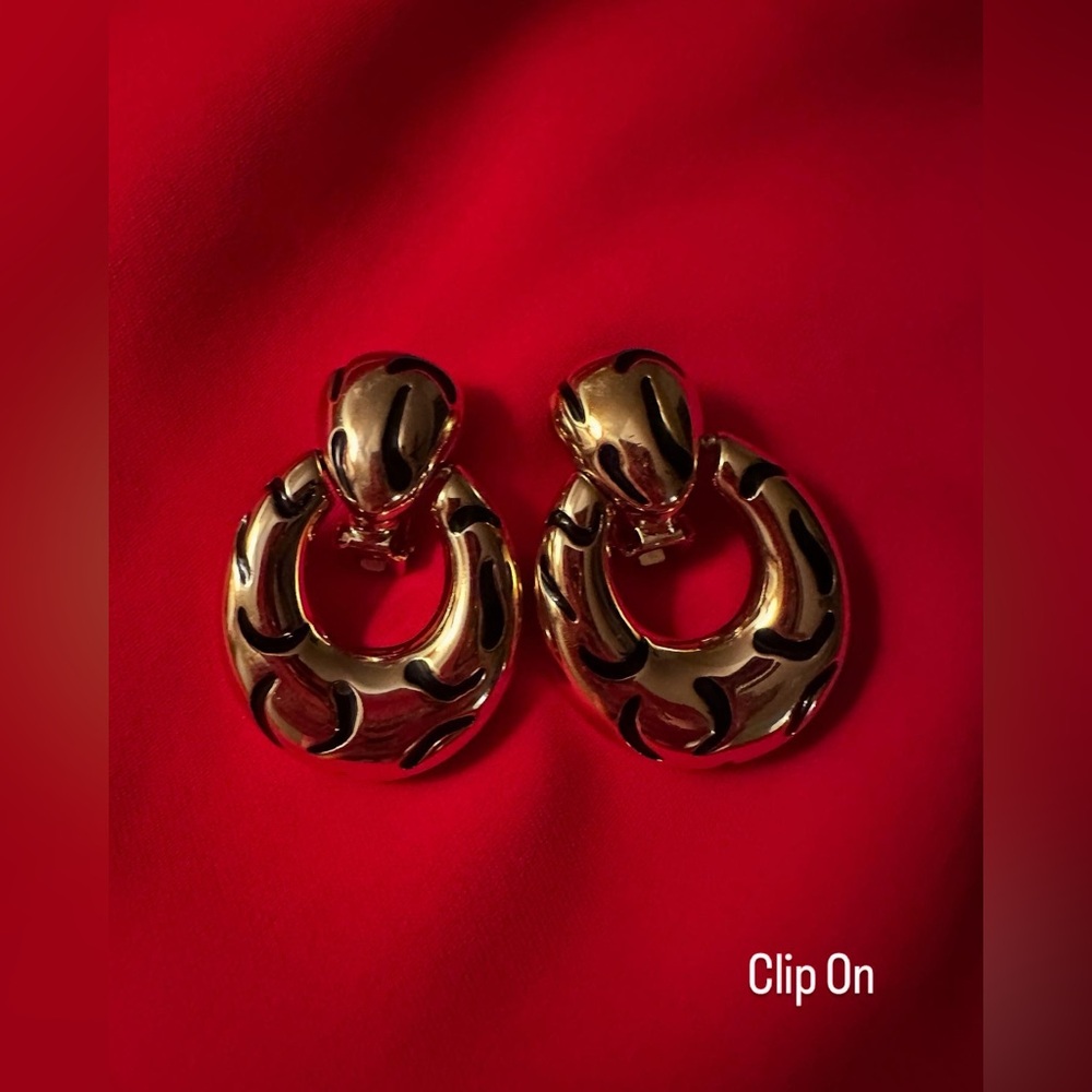 Jackie Collins gold tone clip on earrings